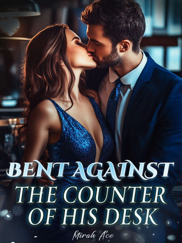 Bent Against The Counter Of His Desk